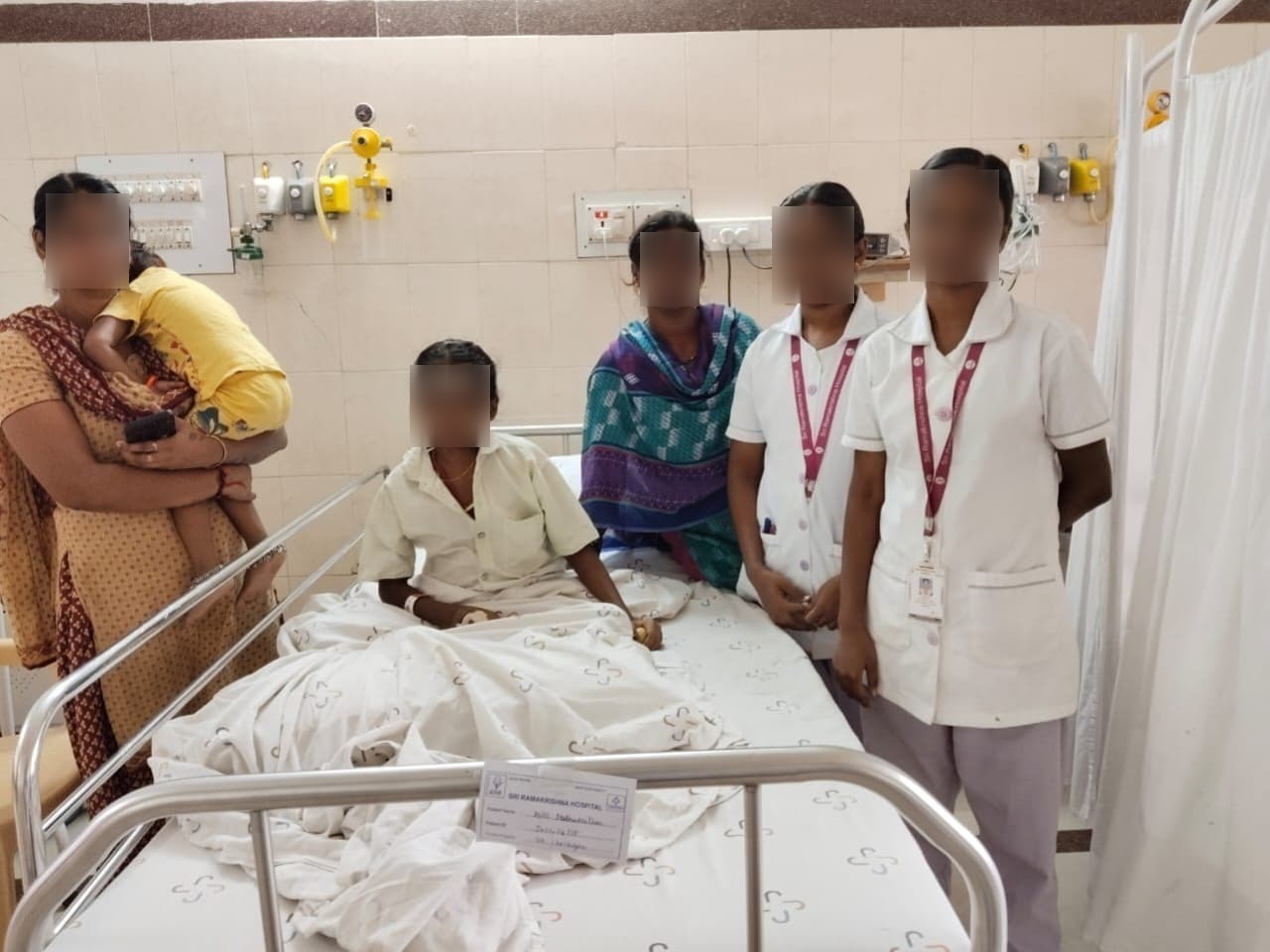 Patient Madhumitra with family and medical team at Sri Ramakrishna Hospital